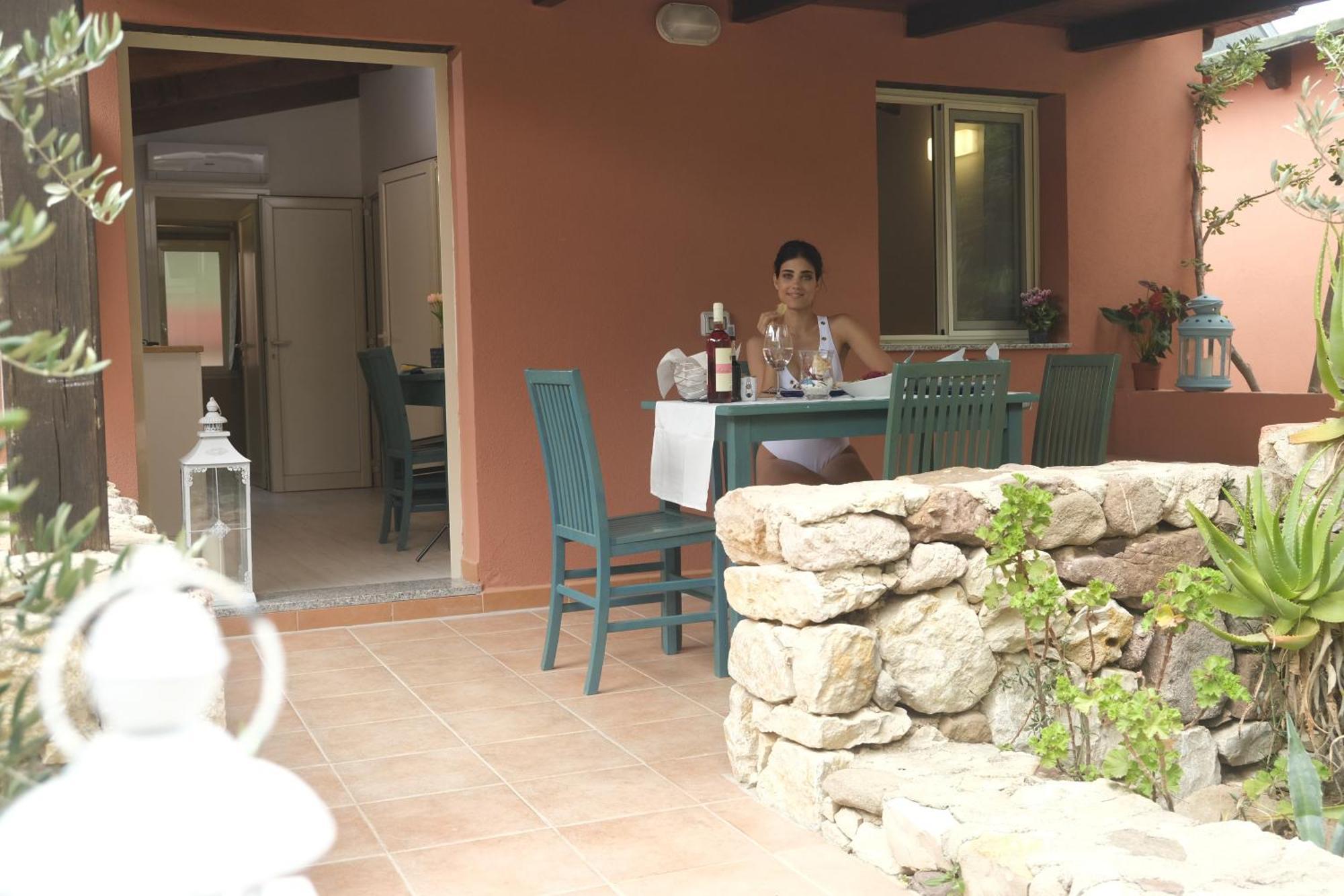 Villaggio Camping Torre Del Porticciolo Porto Conte Oda fotoğraf